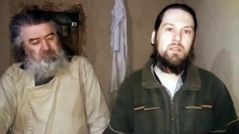 Пилоты Лионел Буруянэ и Михай Крихан в афганском плену.