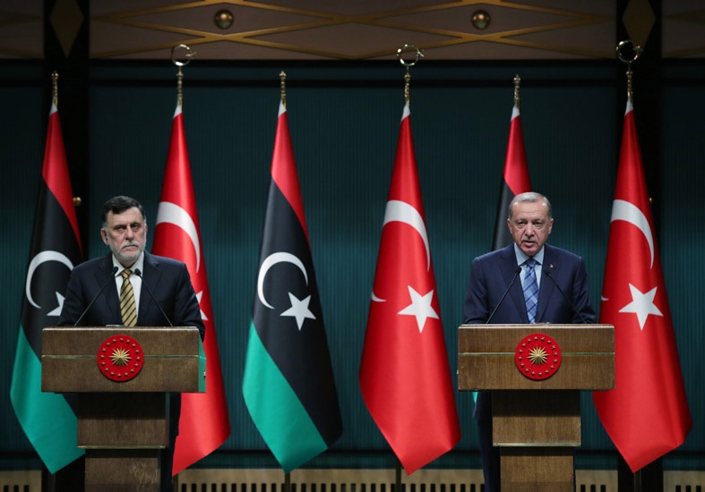 Президент Турции Тайип Эрдоган на совместной пресс-конференции с главой Правительства национального согласия Ливии Фаизом Сарраджем в Анкаре.