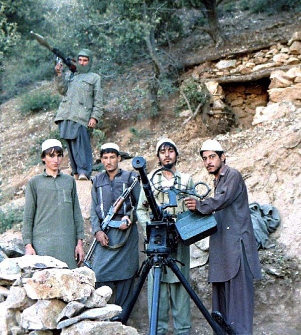 Моджахеды ИОА, вооружённые ДШК, АКМС и РПГ-7. 1987 год.